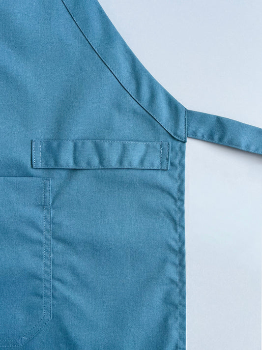 pechera CAM en tela Oxford color petróleo