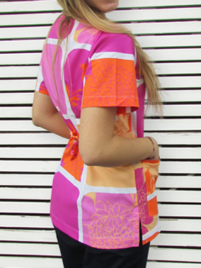 Blusón Salud estampado cuadros naranjos fucsia