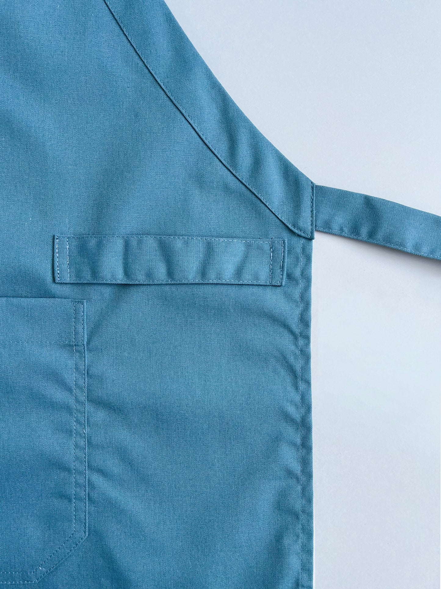 pechera CAM en tela Oxford color petróleo