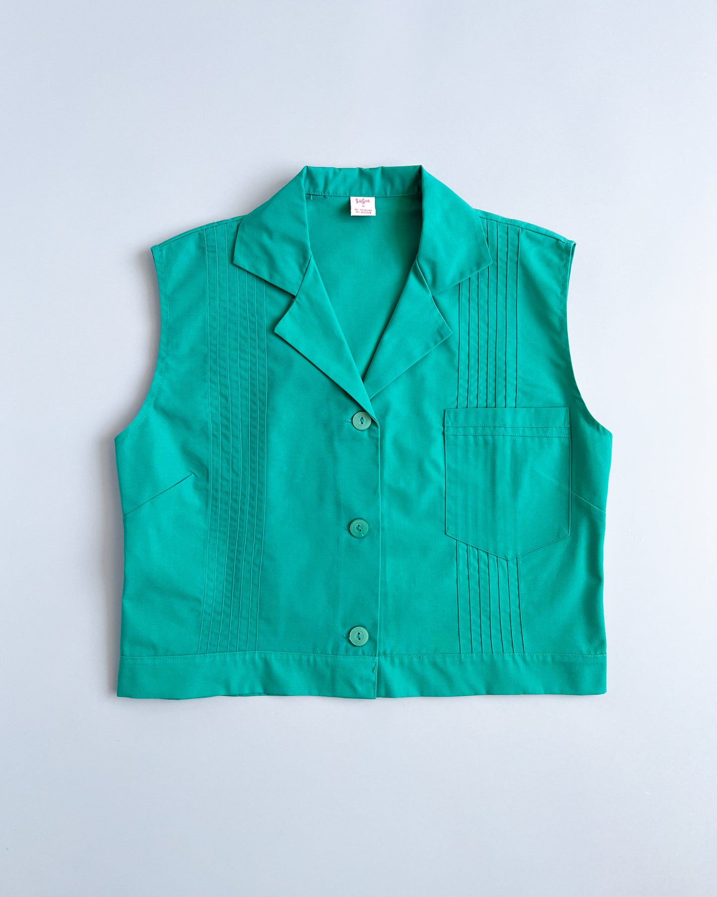 Blusa sin mangas verde turquesa