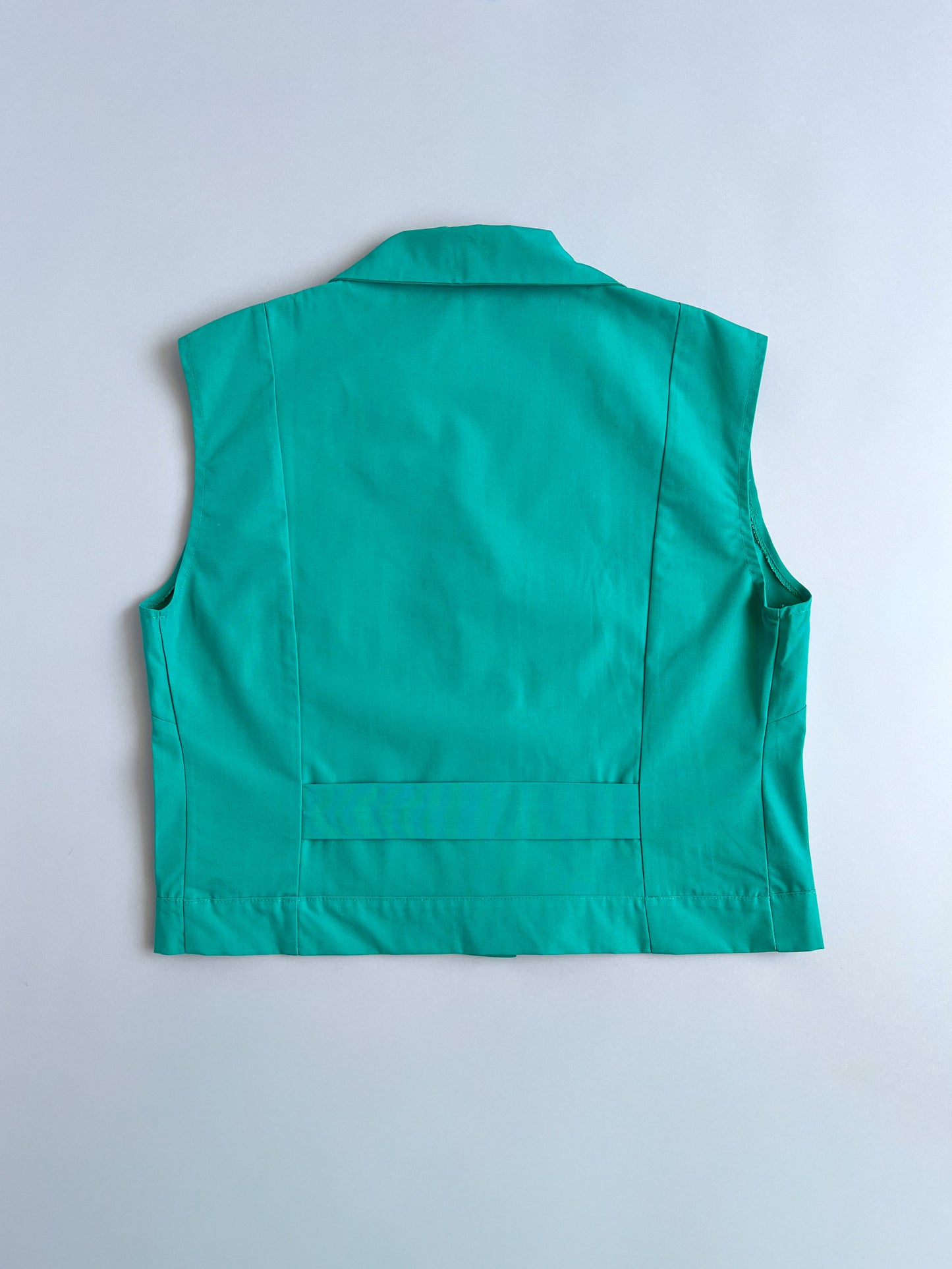 Blusa sin mangas verde turquesa