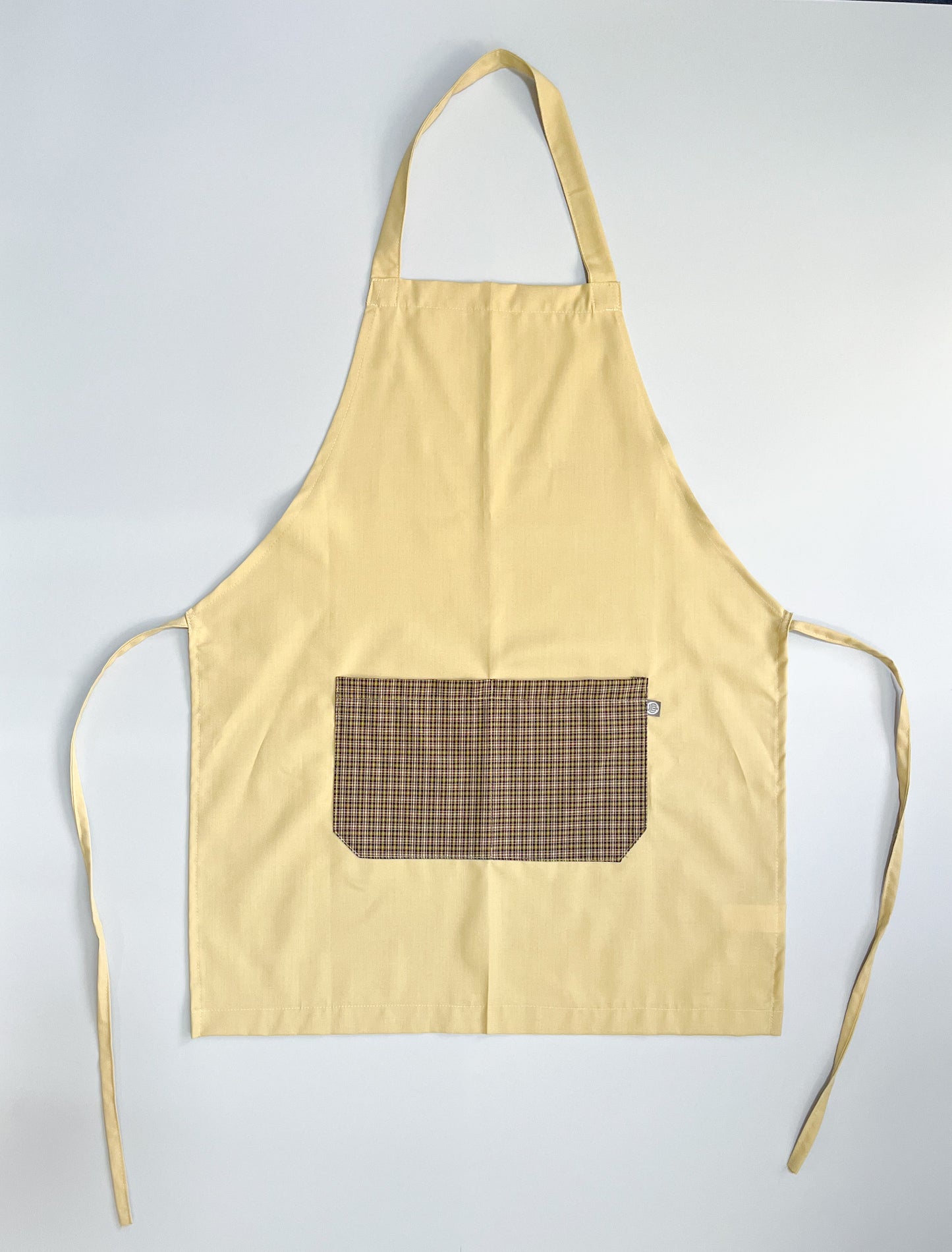 Pechera Carpintero unisex beige con escosés