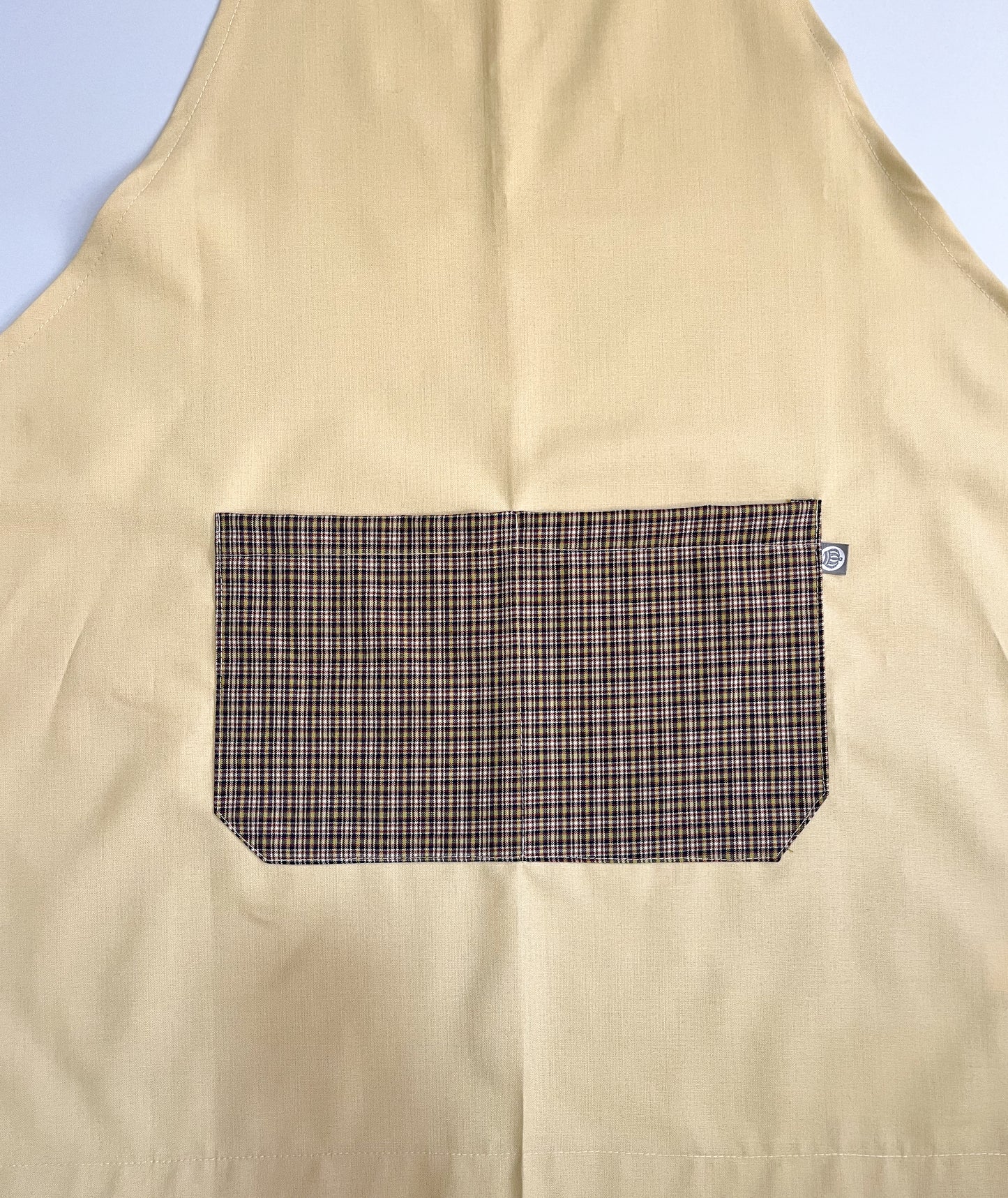 Pechera Carpintero unisex beige con escosés