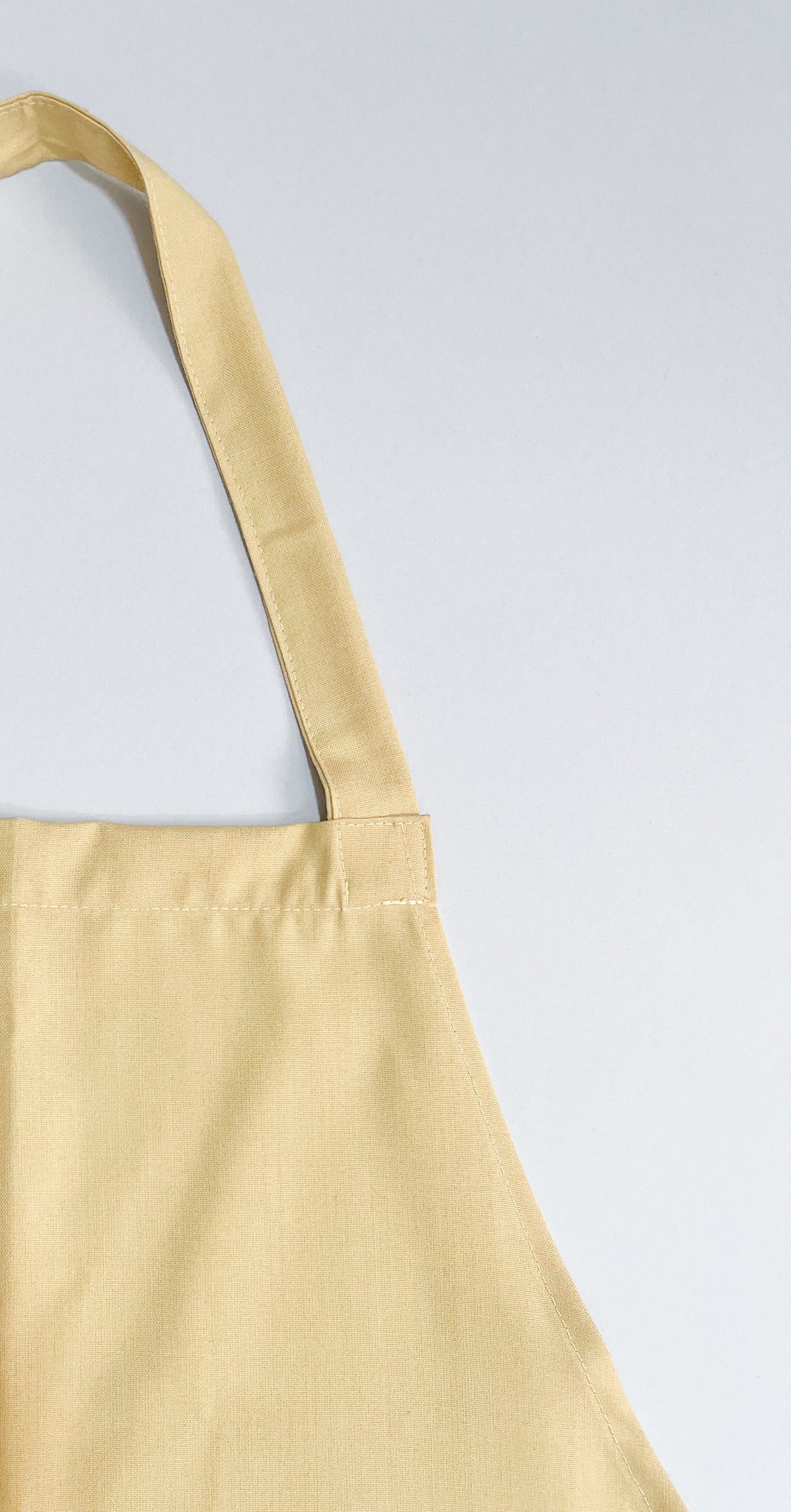 Pechera Carpintero unisex beige con escosés