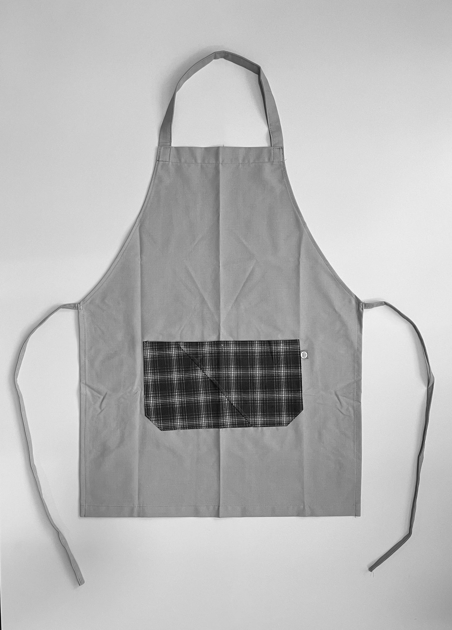 Pechera Carpintero unisex gris claro con bolsillo escocés